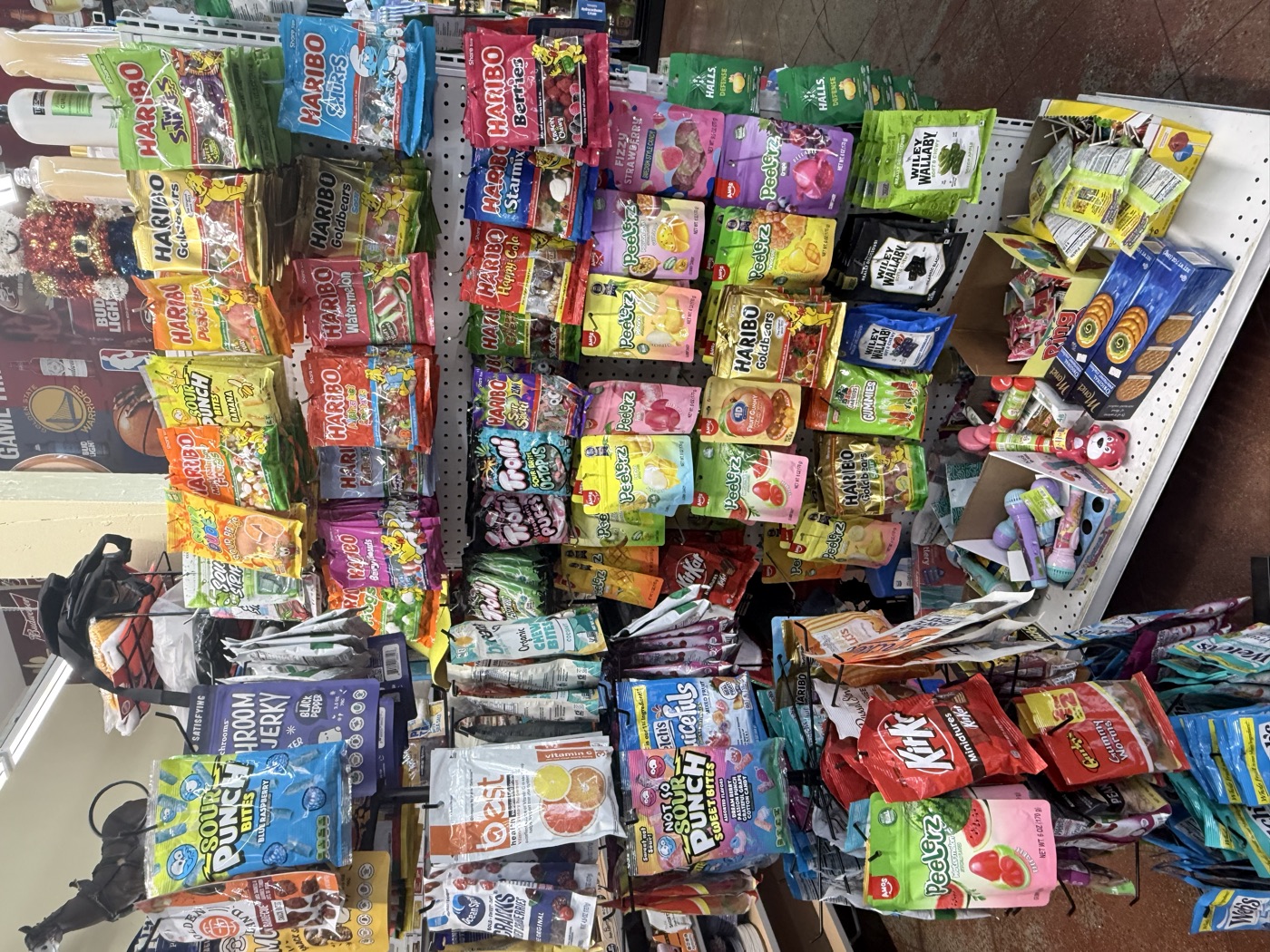 Inside Eddy's Market — the candy wall